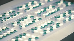 Capsule packing machine in a factory - Free Stock Video