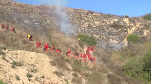 Raging wildfire in Malibu sparks mass evacuations