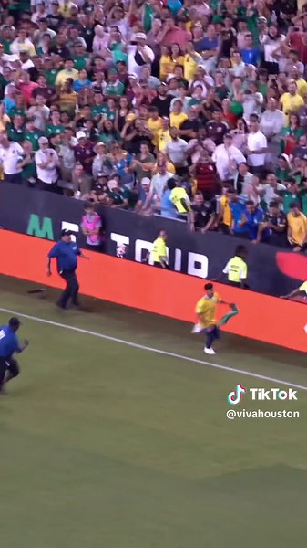 Unexpected Interruption: Fans Invade Mexico vs. Brazil Soccer Game