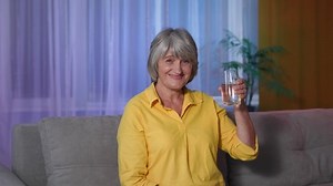 clip-1082957800-water-balance-body-close-thirsty-smiling-elderly