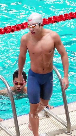 Male Swimmer Diving Technique in Indoor Pool