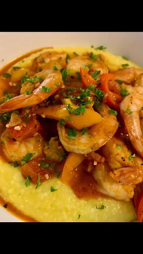 Shrimp & Grits: Home made cheesy grits, topped with shrimp, sweet peppers and onions all cooked in a butter, bacon, garlic, chicken stock to make a silky sauce with the perfect amount of Cajun spice. Enjoy | Scott Pientka