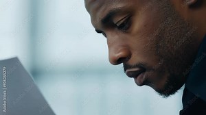 Closeup of a sports agent scribbling notes furiously during a meeting with a potential endort opportunity for their athlete.