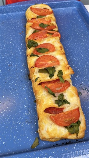 Quick and easy dinner idea Amy makes a cheesy and delicious pizza stromboli with puff pastry, pepperoni, salami, and cheese. | Family Style Cooking