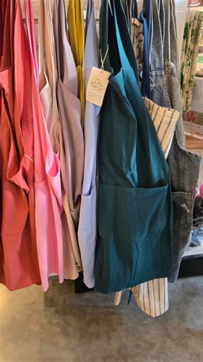 Frog Hollow Farm on Instagram: "👩‍🍳 Made from 100% cotton, these Cate Paper Co. aprons are built for real kitchen work. The cross-back design means no ties to fuss with—just slip it on and you're ready to cook or bake. Handy front pockets keep essentials within reach. Practical, comfortable, great for gifting 🎁, and ready for whatever you're making. #KitchenApron #CottonApron #CatePaperCo #CookingEssentials #KitchenStyle #HomeCook #BakingLife #ApronLove #FunctionalFashion #Kitchenware"