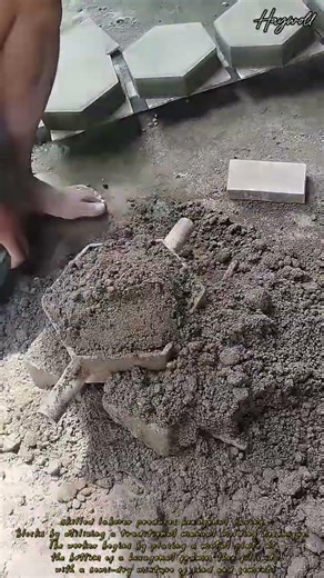 Handcrafting hexagonal interlocking pavers using a manual metal mold and dry-mix concrete