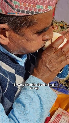 Blowing Shankha (Conch Shell) in Puja