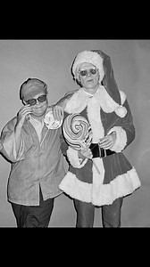 In December 1978, Andy Warhol and Truman Capote appeared together on the cover of 'High Times' in a now-iconic holiday shoot. 🧑🏻‍🎄 Photographed by David Bowie and Lou Reed's photographer Mick Rock at Warhol's Factory, Warhol donned a Santa suit holding his dachshund Archie, whilst Capote appeared as an elf. 🎄 Equal parts surreal, chaotic, and intimate, the session—later detailed in 'The Andy Warhol Diaries'—captured the chemistry, excess, and humor of two cultural icons at the height of thei
