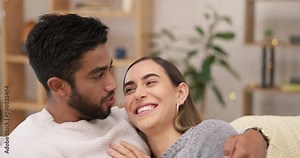 Couple hug on sofa, relax and happy with conversation, spending quality time together at home with love and care. Comfort, peace and relationship, man talk with woman, cuddle on couch with commitment