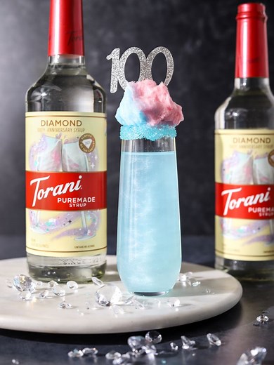 Sweet, fizzy, and bright! 🥂💎 Celebrate 100 years with limited-edition Torani Puremade Diamond Syrup—perfect for sparkling mocktails! ✨ Recipe: https://ow.ly/zptr50UnMgE | Torani