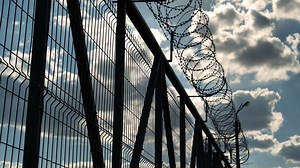 Prison Fence With Barbed Wire Stock Footage SBV-338642291 - Storyblocks