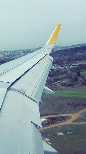 Airplane Landing View from Window Seat Perspective