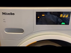 How to cancel the programme on a Miele W1 WWD020 washing machine