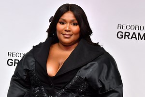 Lizzo Continues To Flaunt Body Transformation With Red Bathing Suit Thirst Trap