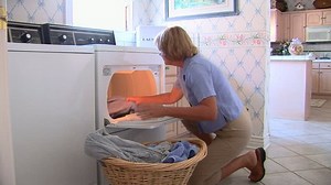 Mature Woman Removing Clothes Dryer Stock Footage Video (100% Royalty-free) 920041 | Shutterstock
