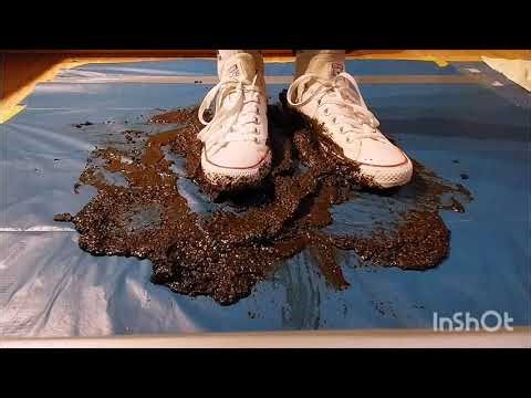 New white Converse and socks in mud