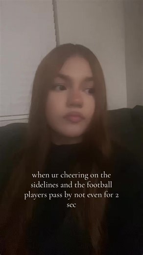 Cheerleaders at the Sidelines: A Fun Moment