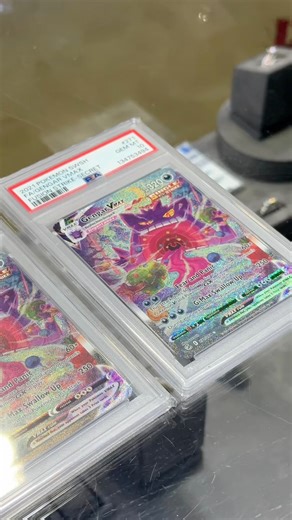 4 comments |  Not one, but TWO PSA 10 Gengar VMAX Secret Rares available… one of the most sought after cards. In stunning condition, graded, & ready for display. These are hard pulls so be the first to get one because they will be gone quick! 勞 #pokemon #pokemoncards #pokemoncardcollector #pokemontcg #vmax #pokemoncollection #pokemoncollector #pokemoncardcollection #pokemonpulls #tcg | Bayou Pawn & Jewelry | Facebook