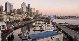 Time lapse of Waterfront, harbour and City skyline from near Pike Place Market at dusk, Seattle, Washington, USA, North America