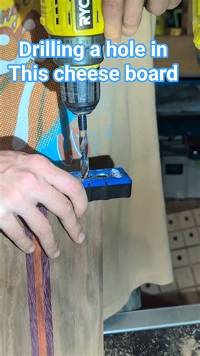 Drilling out the hole for the cheese board hardware #woodworking #woodwork #cheeseboard #drill