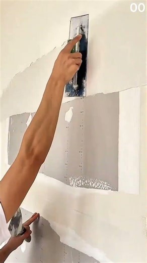 Applying plaster smoothly, finishing seams on drywall