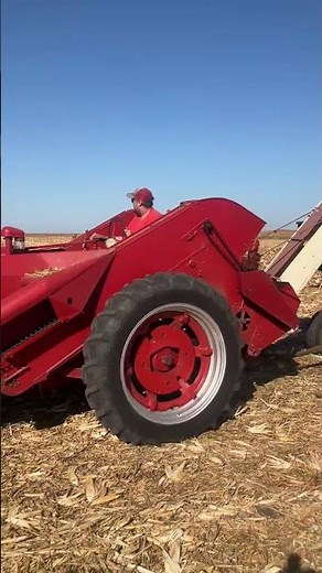 Super M/2MH corn picker heading to the field.