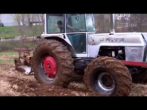White 2-105 plowing with a four bottom International 540 plow