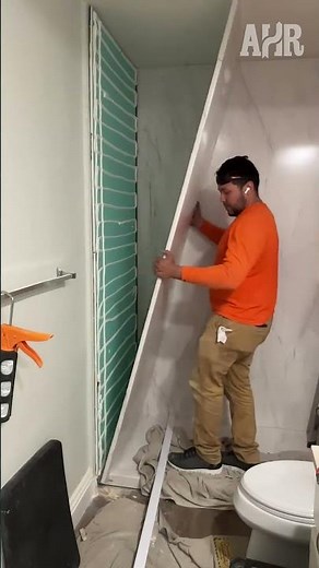 Cutting an Affordable Bathroom Panel to Fit the Wall