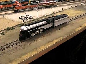 HO scale MTH New York Central Empire State Express Hudson coming to a stop on the layout.