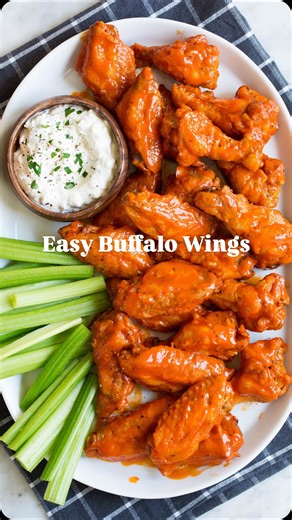 Cooking Classy on Instagram: "Easy Buffalo Wings for game day 🏈 Spicy buffalo wings just like the restaurants serve—made at home without the deep-frying mess. These crispy oven baked buffalo wings are coated in a fiery, buttery buffalo sauce and served with creamy blue cheese dip for dunking. Perfect for a Super Bowl party, game day spread, or anytime you’re craving wings without deep frying… 👉Save this for Super Bowl Sunday 💬 Comment WINGS and I’ll DM you the recipe. &#x