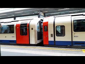 London Underground Central Line: 1992 Tube Stocks #91311 & #92074 leaving Stratford