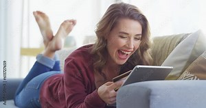 Excited woman on couch with tablet, credit card and mobile app for online shopping discount offer or deal. Happiness, celebration and girl on sofa on web for ecommerce, banking or cashback on website