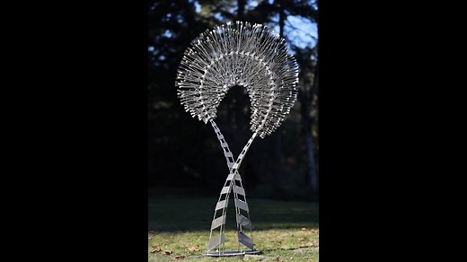Artist creates a kinetic wind sculpture.