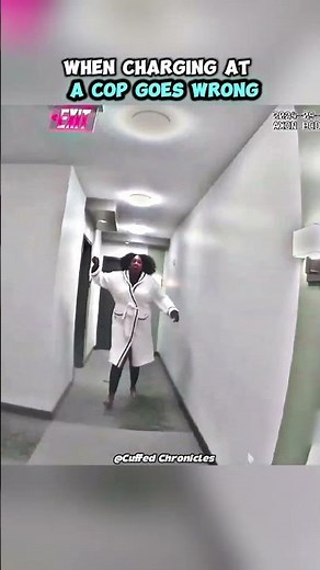 Angry Woman Charges at Cop With Knife