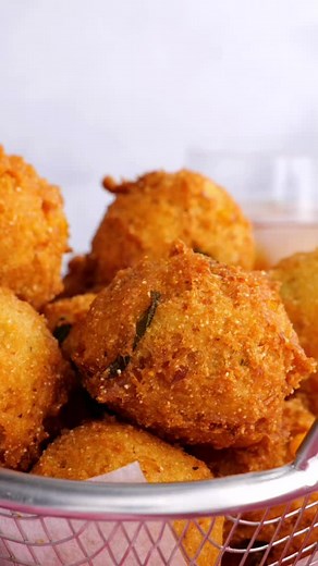7.3K views · 188 reactions | This hush puppies recipe makes one of my favorite Southern side dishes. Bite into the crunchy cornmeal coating and you’re greeted with the most fluffy and flavorful inside, studded with sweet corn kernels and chopped green onion. Recipe: https://www.southernplate.com/hush-puppies/ | Southern Plate | Facebook