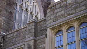 Gothic windows and masonry of church.