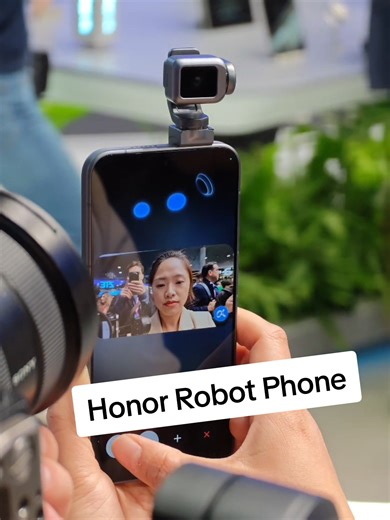 Honor's Robot Phone concept is wild. It adds a gimbal camera to your phone for cinematic stability. At the moment this is just a concept being shown off at MWC 2026 — but could this be the future of video on phones? #honor #honorrobotphone #mwc #mwc2026
