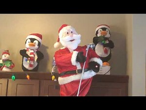 Gemmy Animated Singing and Dancing Santa Claus and Penguins