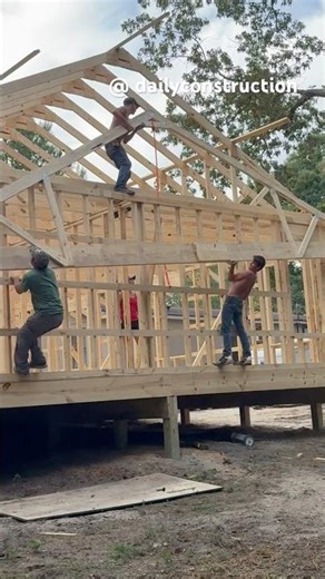 Setting 30 foot trusses by hand ￼