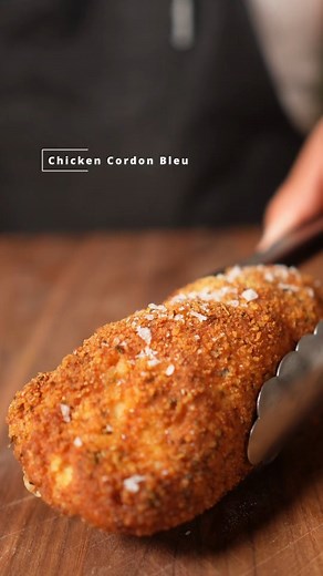 Jose Xiloj on Instagram: "Chicken Cordon Bleu. It's an easy way to wow at dinner! #chicken #chickencordonbleu #cordonbleu #dinner Ingredients- Chicken breast Swiss cheese Ham slices S&P to season breading station Garlic/onion powder to season breading station Butterfly your chicken breast and pound it out until it's thin. Stuff your chicken breasts with cheese ham and seasonings. Place in the fridge to form up about thirty minutes. Make a breading station and season it. Is bread your cord on blu