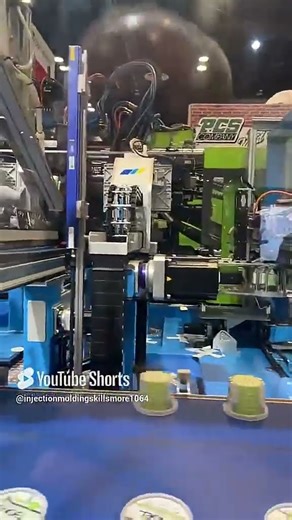 Insert molding labels into mold lids bottoms