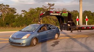 Toyota Prius Becomes Ultimate Tow Vehicle With Gooseneck Hitch Upgrade