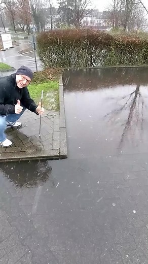 Drain Unclogging on Flooded Street — Satisfying Fix