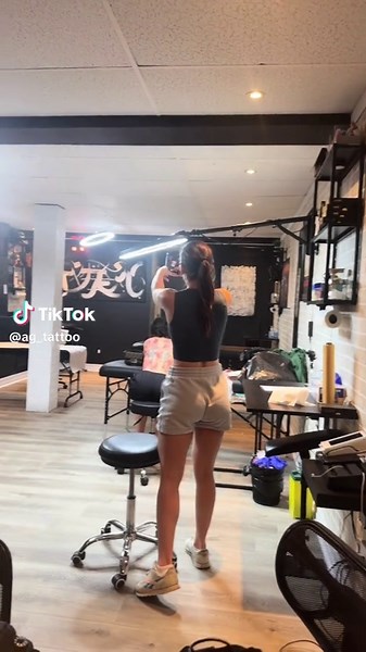 Alyssa’s Stunning Red Flower Backpiece Tattoo