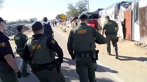 Orange County Sheriffs began the process of clearing out the Santa Ana riverbed homeless encampments today. Sheriffs went tent-to-tent informing the homeless that assistance was available and that the riverbed will be closed for the next three months. Read more about the removal process: https://www.ocregister.com/2018/01/22/live-coverage-orange-county-begins-clearing-santa-ana-riverbed-homeless-encampments/ | Orange County Register