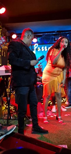 Live Music Performance with Energetic Female Singer