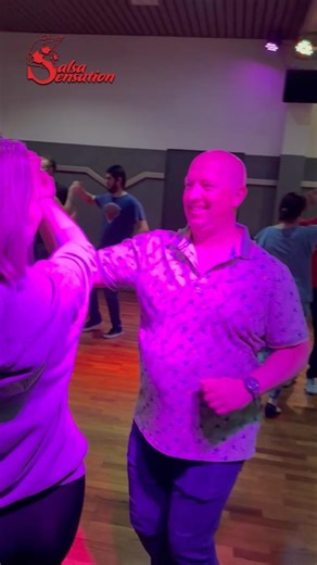 Our students practicing their salsa spins!