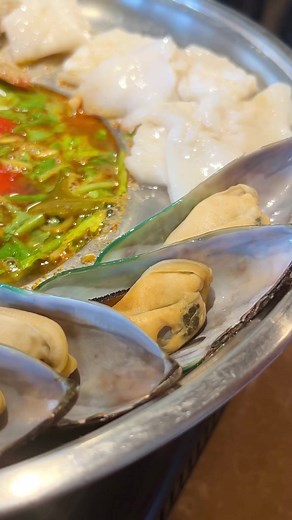 FIRE POT #202 🔥🥢 LAU DO BIEN THAI — a combination of squid, scallops, shrimp, and green mussels; cooked tableside in a sour soup broth and served with rice noodles. #vietnomnom #vietfood #hotpot #firepot #seafood #stl | Mai Lee Restaurant