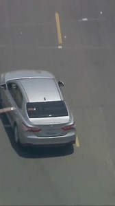 27K views · 129 reactions | LIVE UPDATE: At 12:40, the driver took off, sideswiping a utility truck and driving in wrong-way traffic. Police laid down a spike strip which appeared to successfully strike a rear tire, though it didn’t bring the pursuit to an end. https://trib.al/6d4vlY9 | KTLA 5 News | Facebook