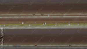 Running red algae water, goes through transparent pipes under the sun, with cooling water that drips nicely on top of each pipe. a fantastic slow motion 4K. (F-log) video clip.